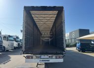 SEMI-REBOQUE KRONE SD 3 EIXOS TETO DE ELEVAR NACIONAL